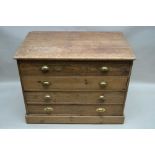 A 19TH CENTURY PINE FOUR DRAWER PLAN CHEST, having plain planked rectangular top, supported on a