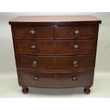 A VICTORIAN MAHOGANY BOW FRONT CHEST OF DRAWERS, having plain top with two inline and three