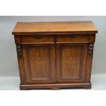 A VICTORIAN INLAID WALNUT SIDE CABINET having plain rectangular top, decoratively inlaid front,