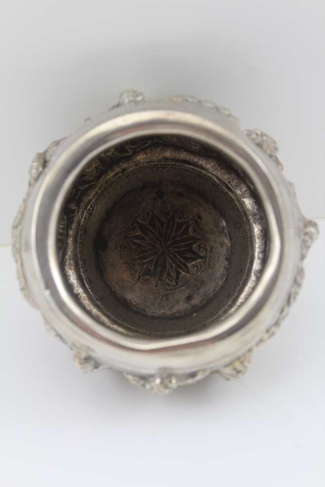 AN EASTERN WHITE METAL BOWL, repousse decoration in the round of warriors in a landscape, 6.5cm - Image 4 of 4