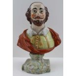 A 19TH CENTURY STAFFORDSHIRE POTTERY BUST OF WILLIAM SHAKESPEARE, on a green and mottled marble