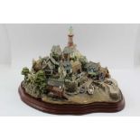 A "LILLIPUT LANE" LIMITED EDITION (3000) "Out of the Storm", cast and painted resin coastal