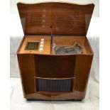 A MID 20TH CENTURY 'BUSH' RADIOGRAM, fitted internal 'Garrard' turntable and FM, medium wave, long