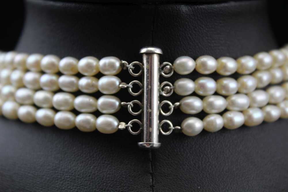 A PEARL NECKLACE, four strands of graduated cultured pearls with silver fastening, - Image 2 of 5