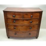 A 19TH CENTURY MAHOGANY FINISHED BOW FRONT CHEST OF DRAWERS, with bead carved edges, two inline