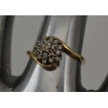 A 9CT GOLD DIAMOND CLUSTER DRESS RING, gross weight; 2.4g, ring size; "K1/2"