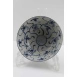 AN EARLY 19TH CENTURY CHINESE PORCELAIN BOWL, salvaged from the 1822 "Tek Sing" wreck, bears "