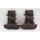 A PAIR OF LATE 19TH CENTURY BLACK FOREST WOOD CARVINGS, each depicts Chamois, 20cm x 17cm