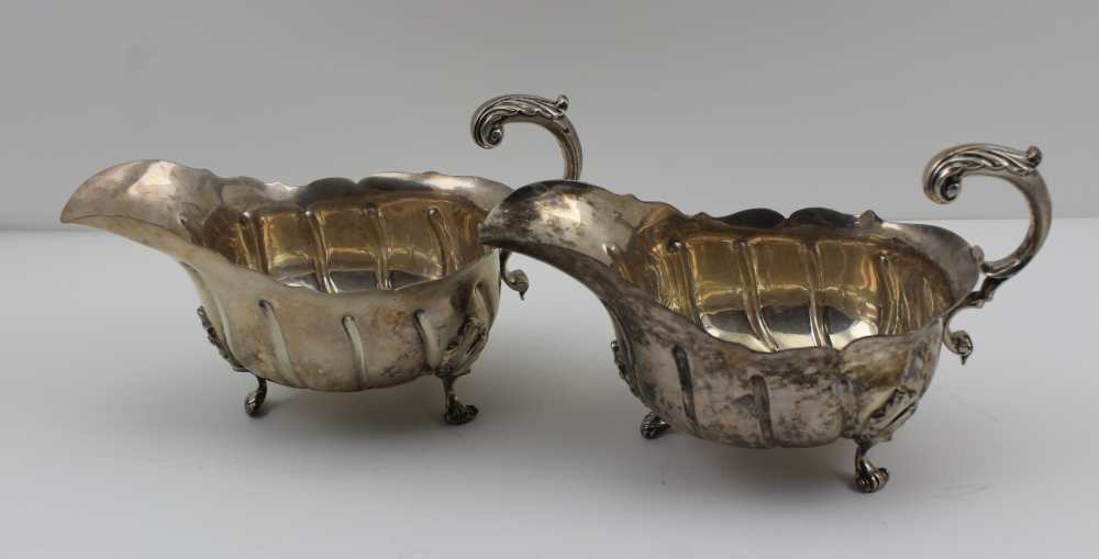 GOLDSMITHS & SILVERSMITHS CO. (William Gibson & John Lawrence Langman) A PAIR OF LATE VICTORIAN