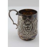 WILLIAM HUTTON & SONS LTD. A LATE VICTORIAN CHRISTENING MUG, repousse floral design, scroll