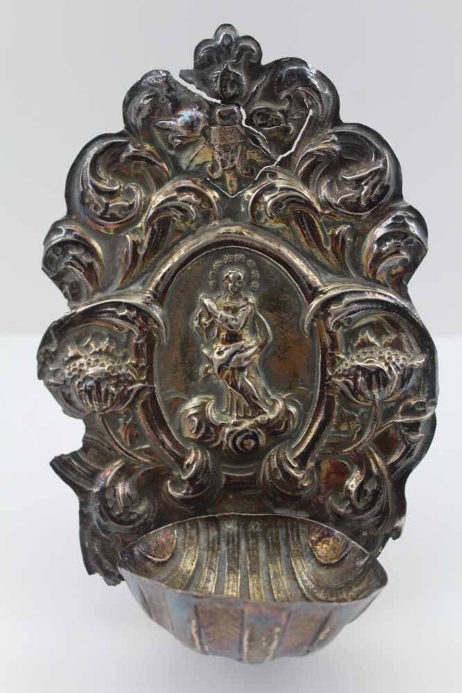 AN 18TH CENTURY CONTINENTAL REPOUSSE SILVER HOLY WATER STOUP, which would have been hung in the