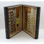 AN EARLY VICTORIAN BUCKRAM BOUND ENTOMOLOGICAL CASE in the form of a book with gilt titles,