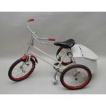 A RE-FINISHED BROOKS SEATED CHILD'S TRICYCLE, finished in white & red, with pneumatic tyres