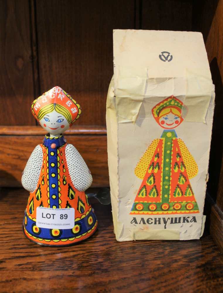 TWO CLOCKWORK DANCING RUSSIAN LADIES, one boxed