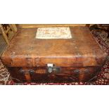 A JOHN POUND & CO. OF LONDON A SOLID LEATHER TRAVELLING CASE, with hessian lined interior, and brass