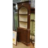 A REPRODUCTION PART PAINTED MAHOGANY FINISHED FREE-STANDING CORNER CUPBOARD