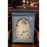 A SHABBY CHIC COUNTRY KITCHEN WALL CLOCK, housed in a painted cupboard