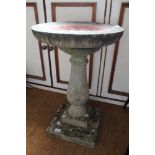 A THREE PIECE CAST BIRD BATH on baluster column