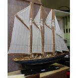 A WELL-MADE MODEL SAILING SHIP ON STAND