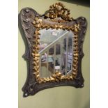 A PRESSED LEAD FRAMED PLAIN PLATE WALL MIRROR with fancy gilt decoration