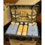 A MID-CENTURY CASED BREXTON PICNIC SET