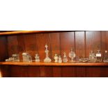 A SELECTION OF PREDOMINANTLY GLASS BASED DRESSING TABLE TOP ITEMS, having hallmarked silver tops