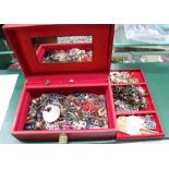 TWO RED FINISHED JEWELLERY BOXES, plus contents