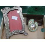 A CAST METAL ART NOUVEAU DESIGN PHOTO FRAME, together with an Italian micro mosaic frame, in the