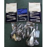 A BOX CONTAINING A SELECTION OF CUTLERY AND SERVING UTENSILS VARIOUS