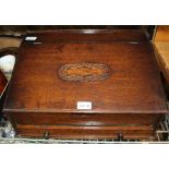 A CONVERTED OAK CLERKS DESK, now containing a canteen of kings pattern cutlery various