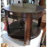 AN ART DECO DESIGN CIRCULAR TOPPED COFFEE TABLE with four quadrant orphans below