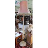 A PAINTED WOODEN STANDARD LAMP with tasseled shade