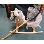 A SMALL WOODEN CHILD'S ROCKING HORSE together with a hobby horse