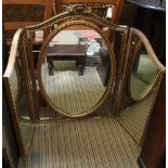 A LARGE TRIPLE PLATE GILT FRAMED DRESSING TABLE MIRROR