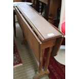 AN ARTS & CRAFTS DESIGN TWIN FLAP SUTHERLAND STYLE TABLE