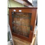A MAHOGANY WALL HANGING DISPLAY CUPBOARD with glass shelved interior
