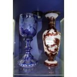 A BLUE FLASH OVERLAID LARGE SIZED GOBLET with grape & vine decoration, together with a frosted glass