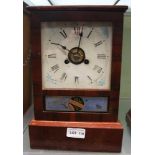 AN AMERICAN MADE MANTEL CLOCK by "Jerome & Co." retaining it's key and pendulum