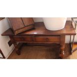 A WELL-MADE REPRODUCTION OAK RECTANGULAR TOPPED COFFEE TABLE having two inline drawers, supported on