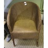 A GOLD FINISHED LLOYD LOOM TUB CHAIR