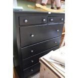 A MODERN BLACK ASH FINISHED TALL CHEST OF DRAWERS