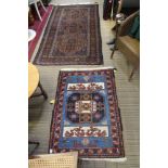 TWO BLUE GROUND WOVEN WOOLEN FLOOR RUGS