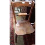 A SINGLE CARVED WOODEN OXFORD BACKED SOLID SEAT CHAIR