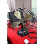 A MODERN WIRE WORK TWIN HANDLED BUCKET, together with a vintage GEC branded electric fan