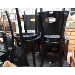 A SET OF FOUR BLACK PAINTED MODERN CAFE STYLE CHAIRS