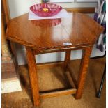 A PAIR OF ARTS & CRAFTS DESIGN OAK FINISHED OCTAGONAL TOPPED TABLES supported on four chamfered legs