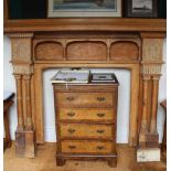 A LARGE FANCY CARVED PINE FIRE SURROUND having display shelf, and pilaster uprights