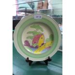 A CLARICE CLIFF FANTASQUE BIZARRE 'DESIGN' HAND-PAINTED PLATE depicting a red roofed house