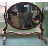 A SMALL SIZED OVAL PLAIN PLATE ADJUSTABLE DRESSING TABLE TOP MIRROR