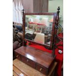 A 19TH CENTURY MAHOGANY FRAMED ADJUSTABLE PLAIN PLATE DRESSING TABLE MIRROR on ring turned